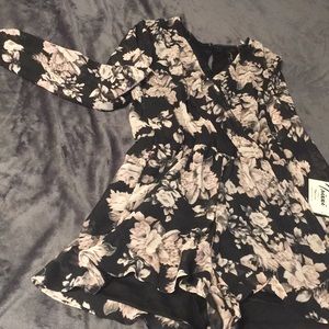 Gorgeous sheer sleeve romper!